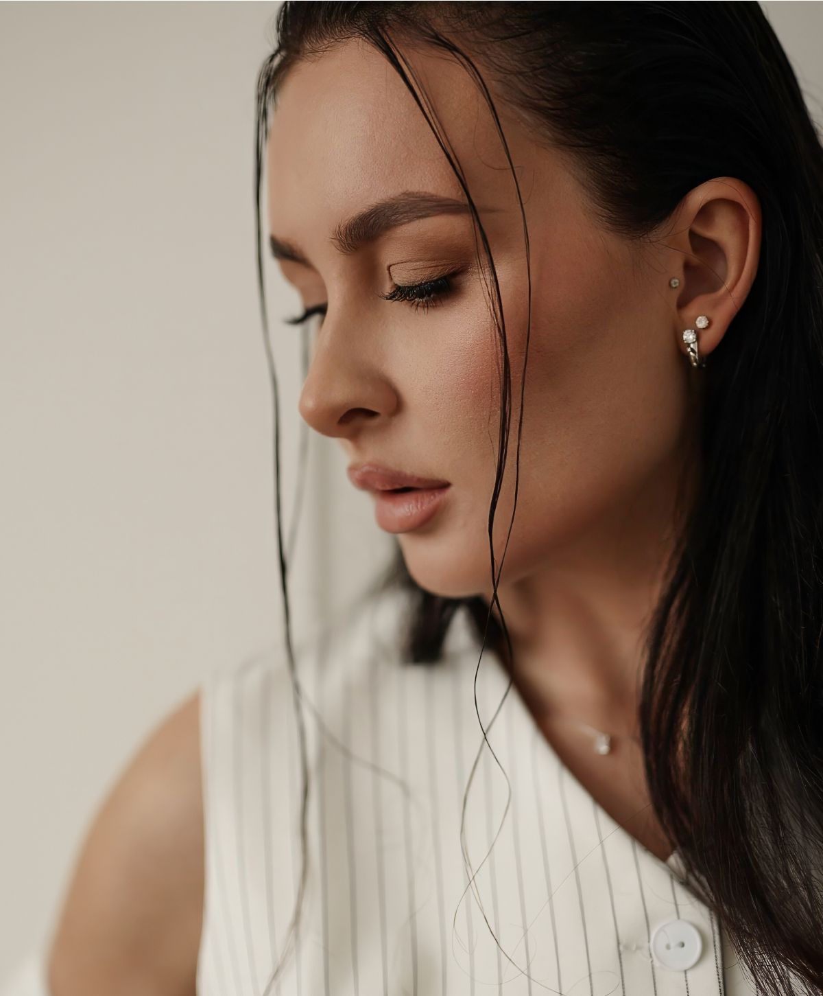Profile of a woman with loose hair.