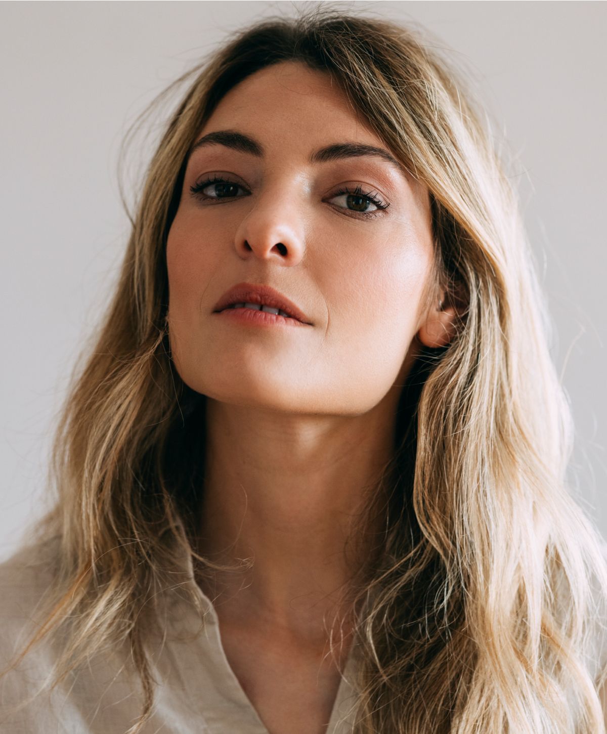 Portrait of a woman with wavy hair.