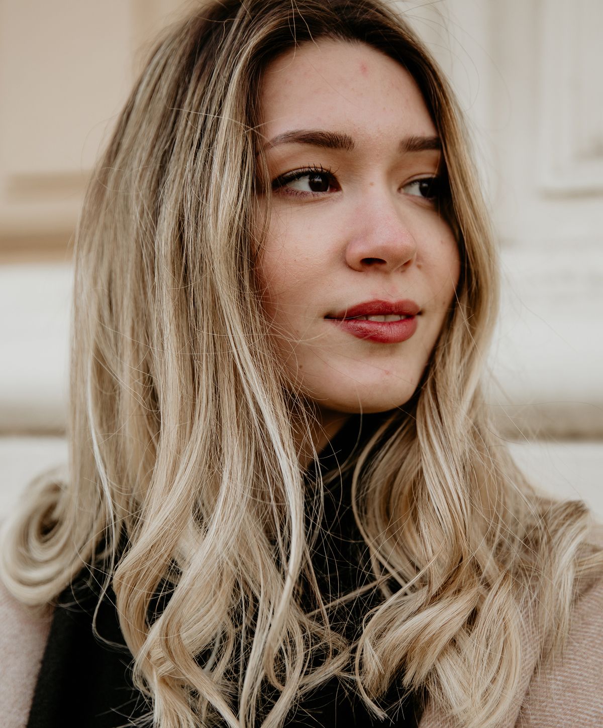 Woman with long blonde hair and natural beauty.